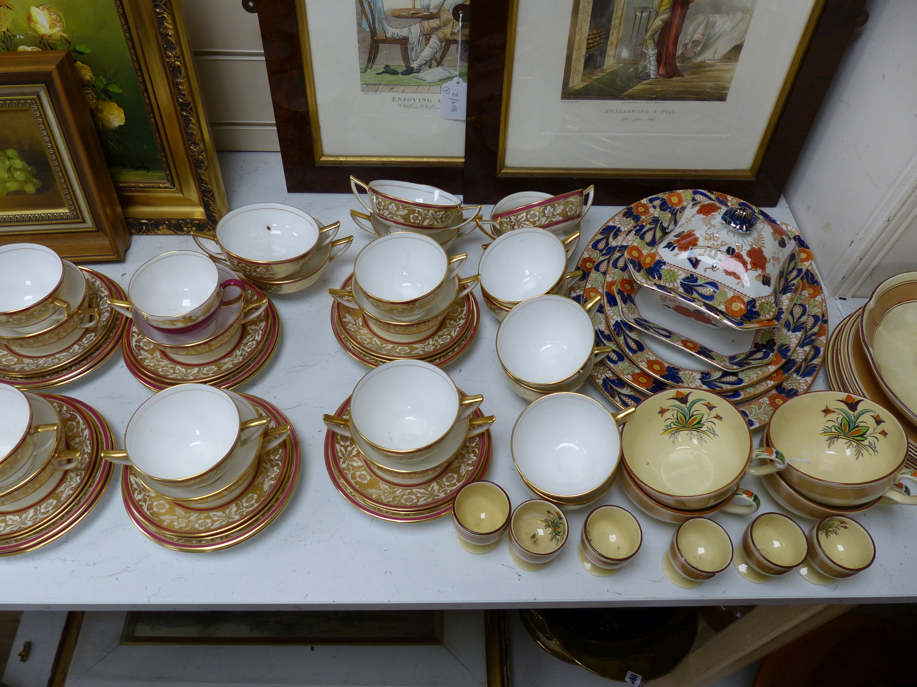 A Mintons breakfast set, a Minton part dinner service and a Woods floral-patterned part dinner service
